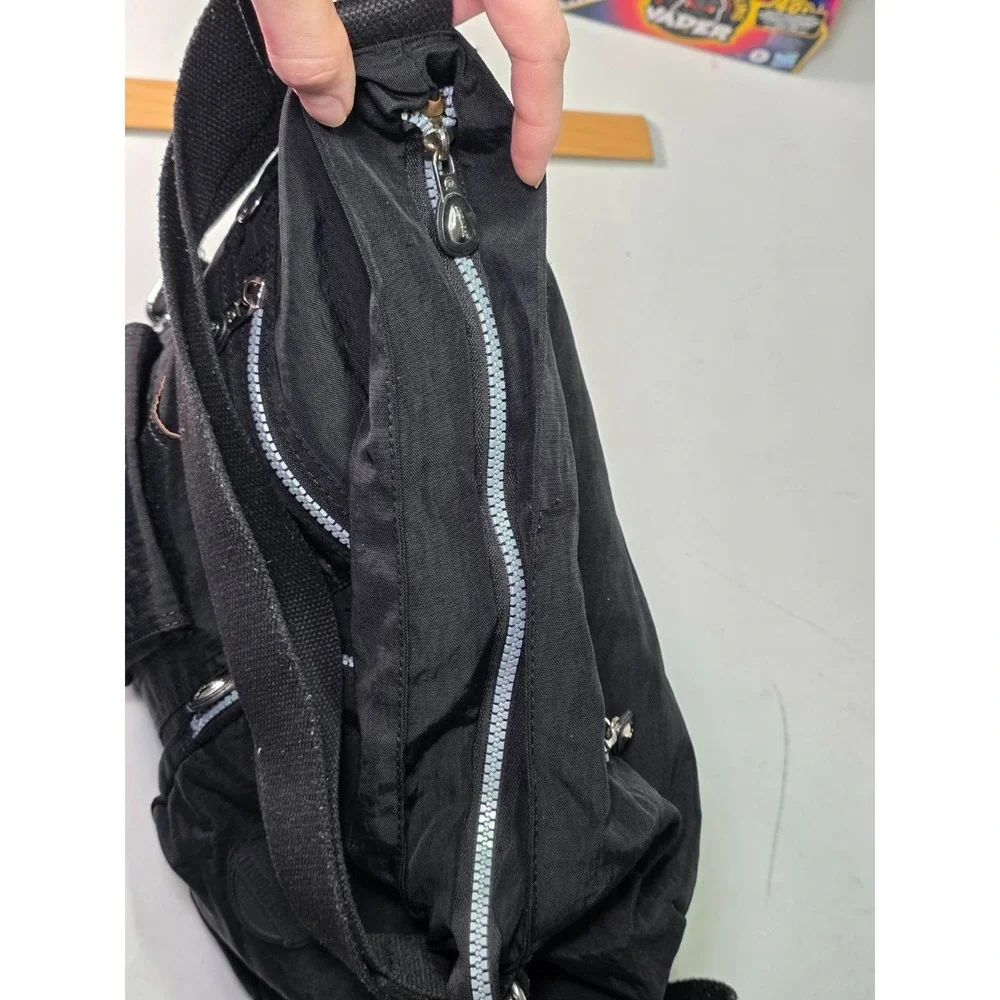 Jinqiaoer Shoulder Bag Backpack Black Multi Pockets Travel Zip Crossbody Bags